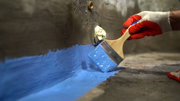 SJ Waterproofing Pros commercial waterproofing team near Mount Olive, AL